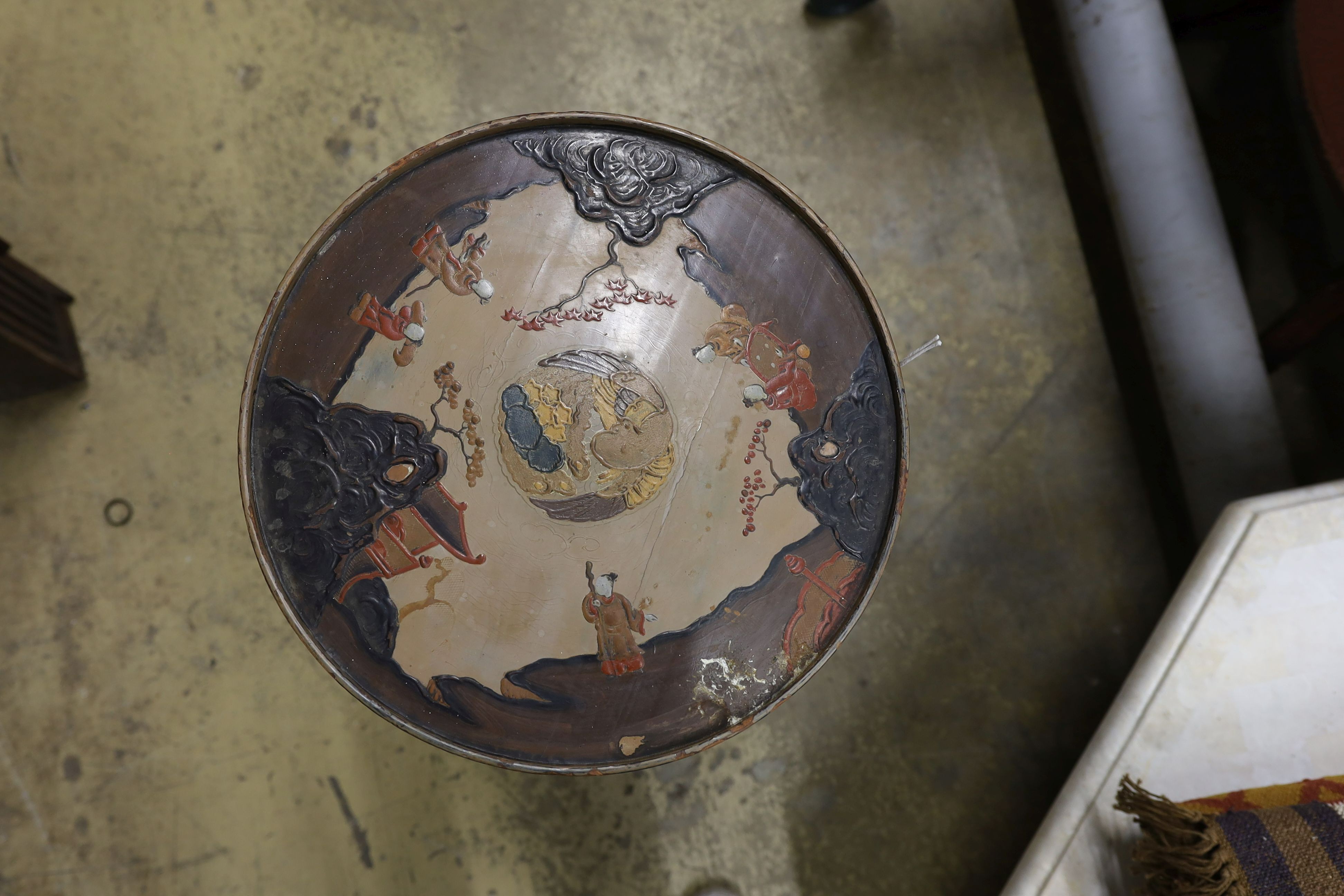 A Chinese lacquer circular wine table, diameter 36cm, height 67cm